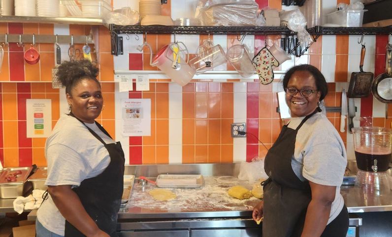 Photo of sisters, chefs, founders working in the kitchen